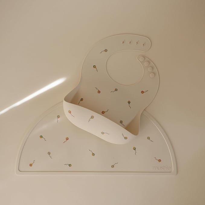 mushie Silicone Baby Bib | Adjustable Fit Waterproof Bibs (Kites)