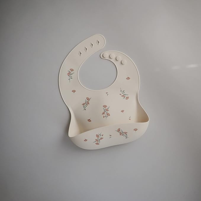 mushie Silicone Baby Bib | Adjustable Fit Waterproof Bibs (Pink Flowers)