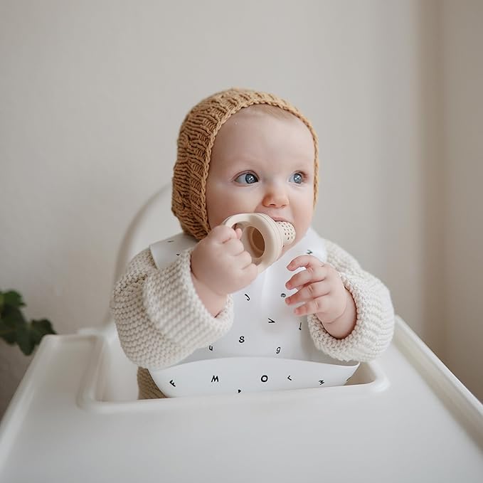 mushie Silicone Baby Bib | Adjustable Fit Waterproof Bibs (Letters White)