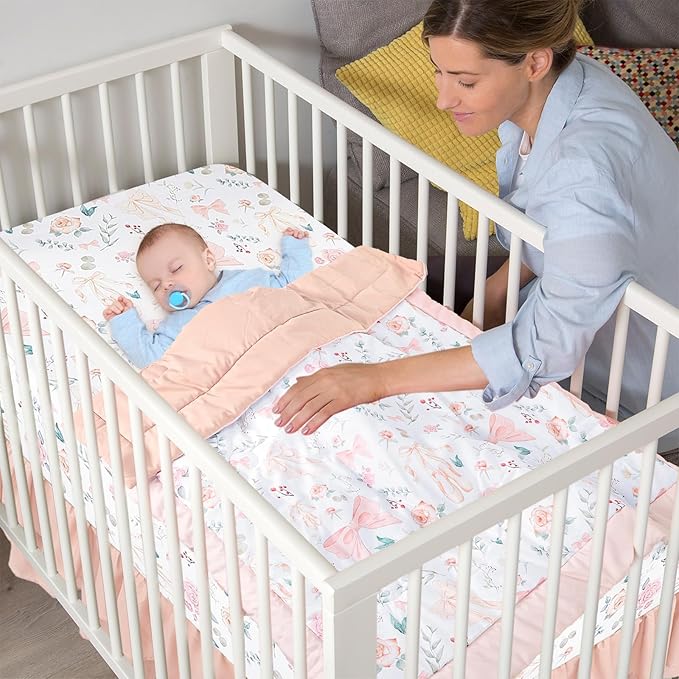 GFU Crib Bedding Set for Girls 4-Piece, Bow Baby Girl Crib Bedding Set Pink Flowes, Nursery Sets Includes Comforter, Fitted Crib Sheet, Crib Skirt, and Diaper Stacker