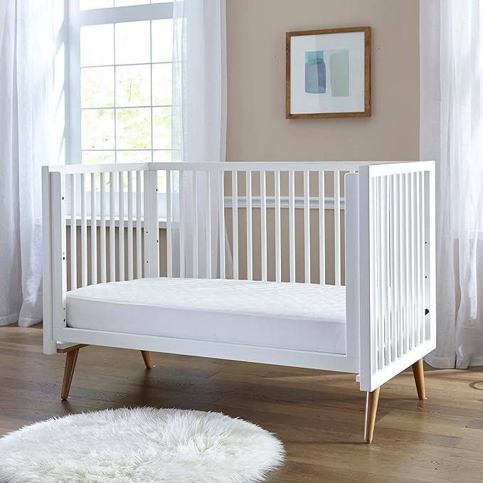 Sealy Baby Stain Protect Antimicrobial Fitted Waterproof Infant Crib Mattress Protector Pad and Toddler Bed Cover, Durable and Comfortable Topper, Machine Washable & Dryer Friendly, 52” x 28”- White